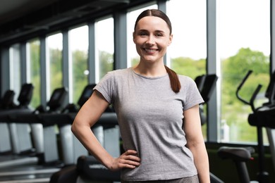 Photo of Portrait of personal trainer in sport center