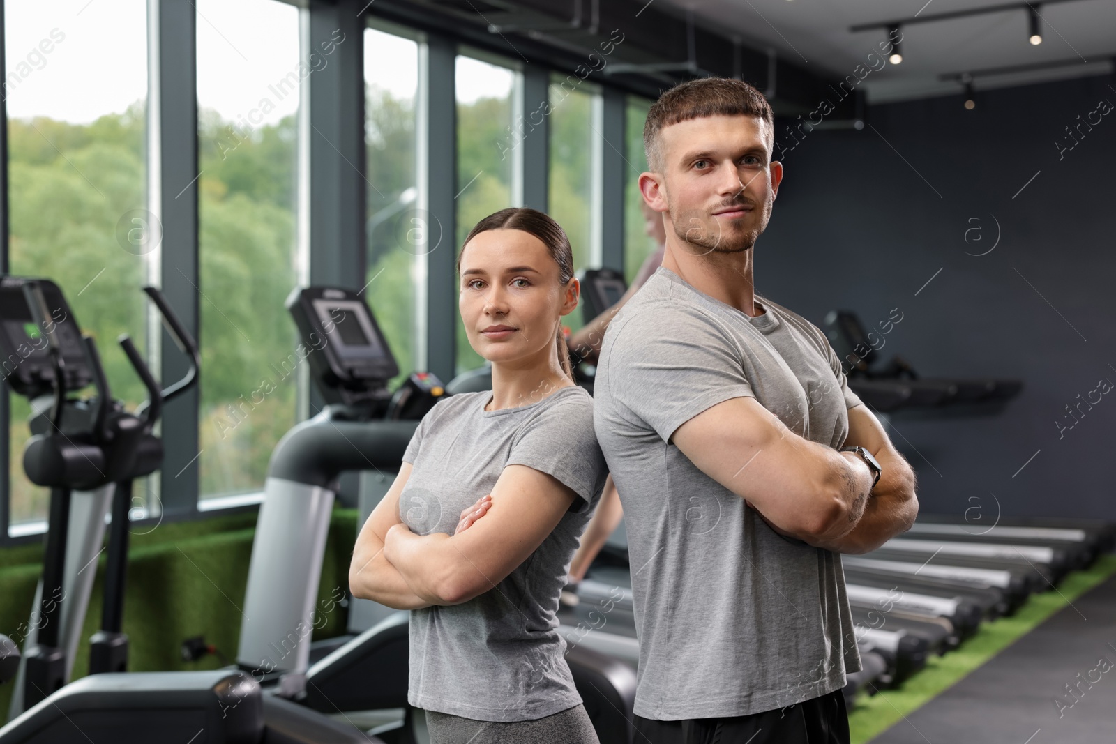 Portrait of personal trainers in sport center Photo of Portrait of personal trainers in sport center