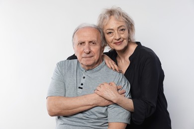 Photo of Portrait of lovely senior couple on white background