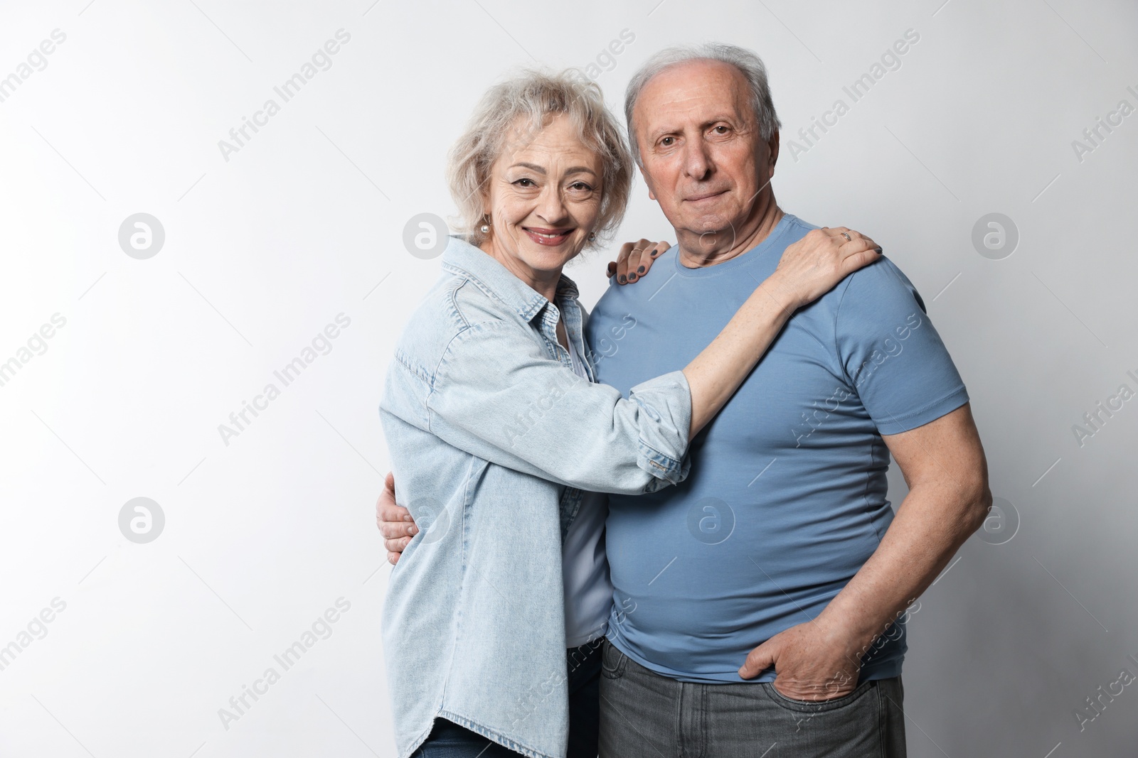 Portrait of lovely senior couple on white background Photo of Portrait of lovely senior couple on white background