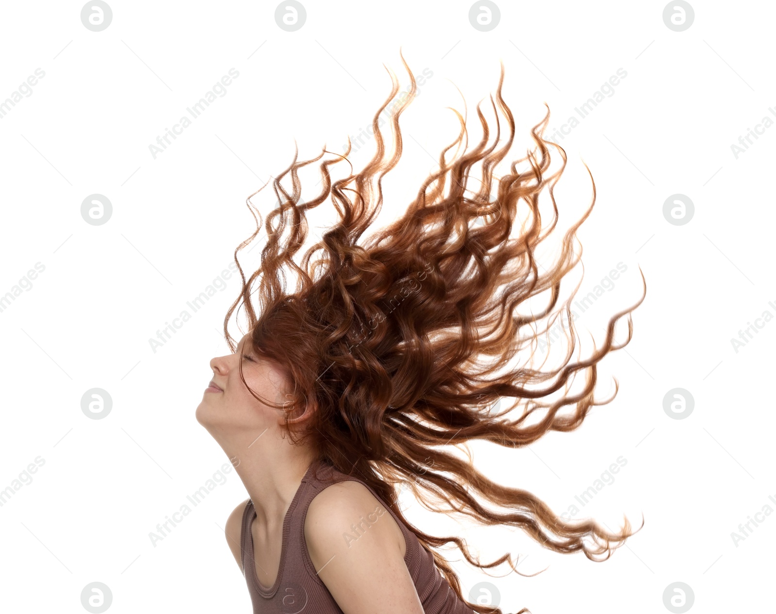Teenage girl with healthy wavy hair on white background Photo of Teenage girl with healthy wavy hair on white background