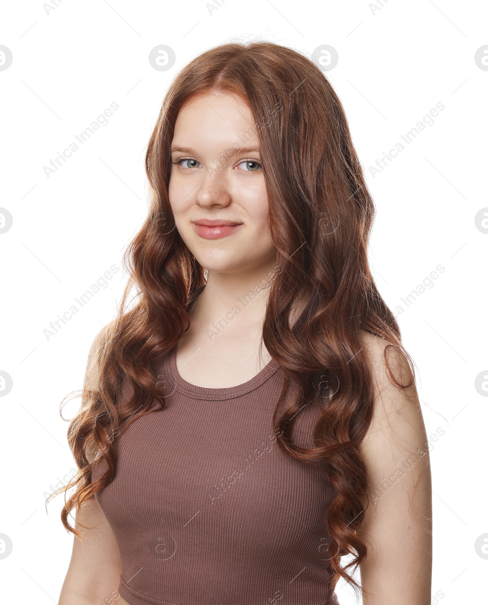 Portrait of beautiful teenage girl with healthy wavy hair on white background Photo of Portrait of beautiful teenage girl with healthy wavy hair on white background