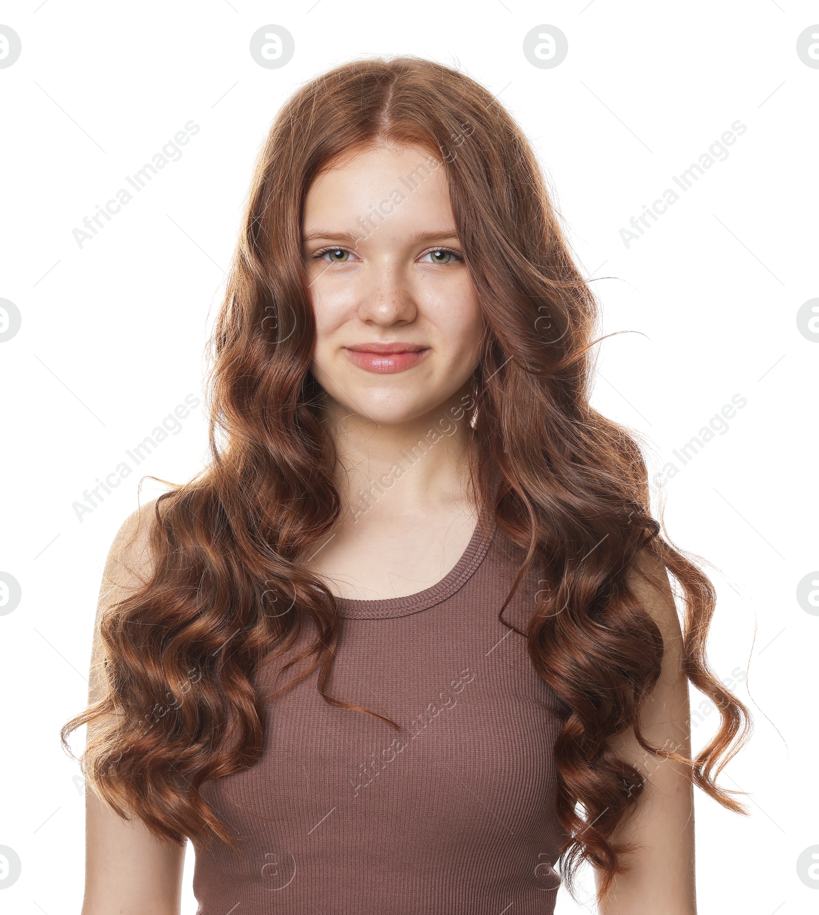 Portrait of beautiful teenage girl with healthy wavy hair on white background Photo of Portrait of beautiful teenage girl with healthy wavy hair on white background