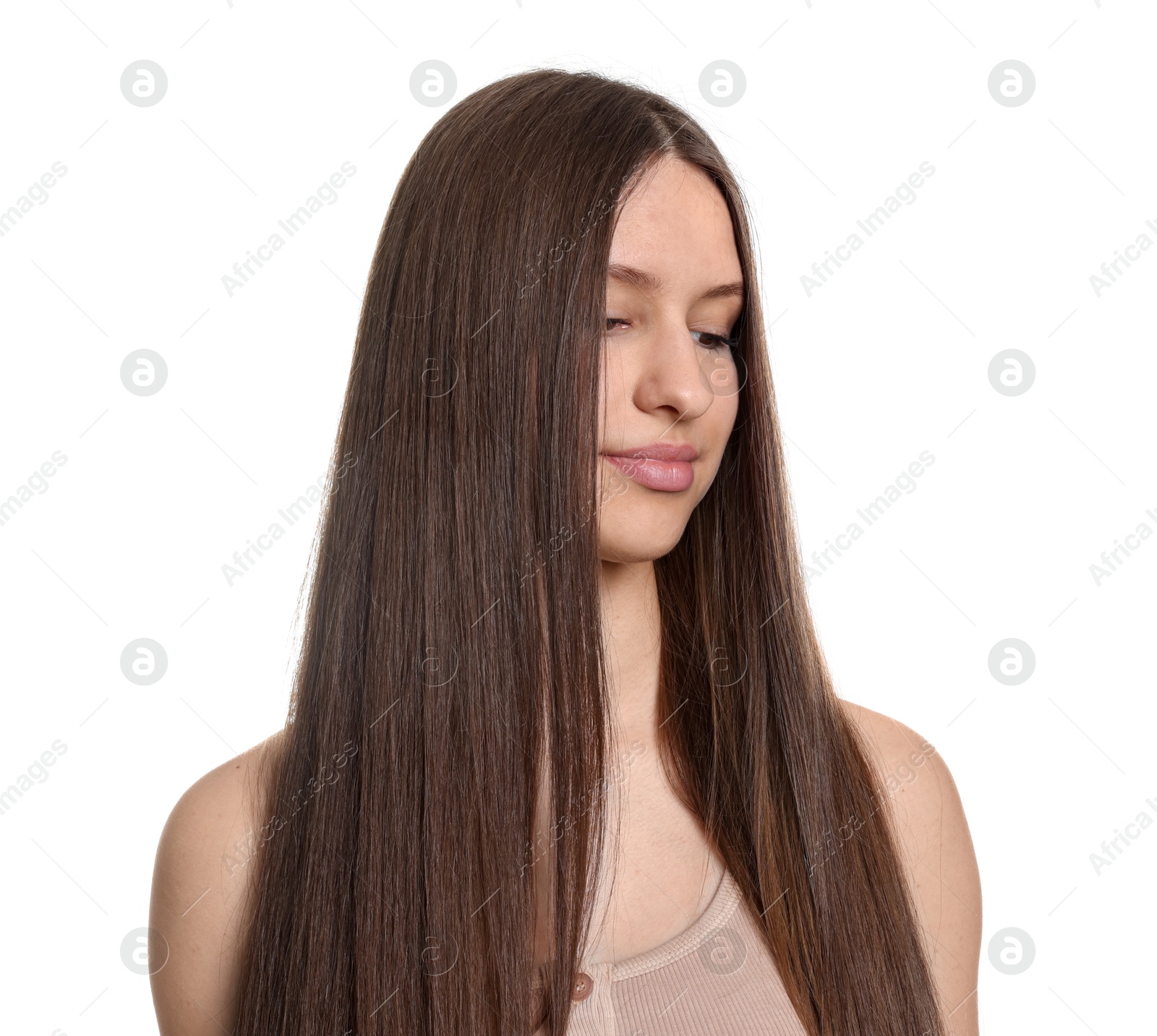 Portrait of beautiful teenage girl with healthy long hair on white background Photo of Portrait of beautiful teenage girl with healthy long hair on white background