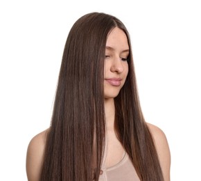 Photo of Portrait of beautiful teenage girl with healthy long hair on white background