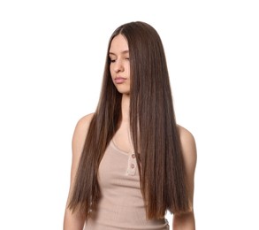 Photo of Portrait of beautiful teenage girl with healthy long hair on white background