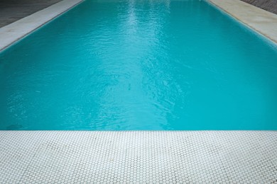 Photo of Clear water with ripples in outdoor swimming pool