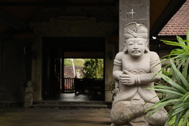 Photo of Bali, Indonesia - May 31, 2025: Beautiful statue outdoors, space for text