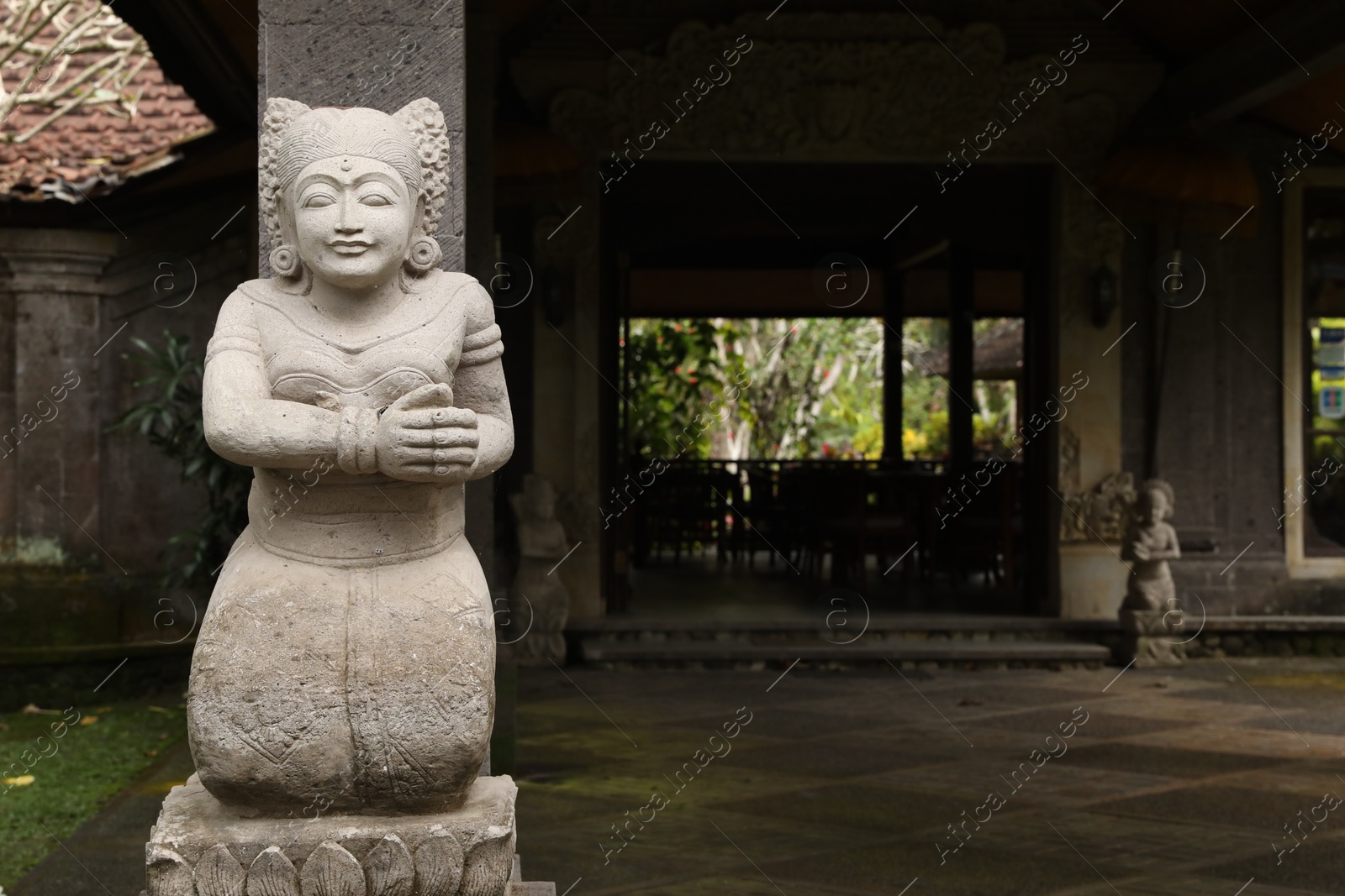 Bali, Indonesia - May 31, 2025: Beautiful statue outdoors, space for text Photo of Bali, Indonesia - May 31, 2025: Beautiful statue outdoors, space for text