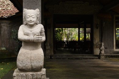 Photo of Bali, Indonesia - May 31, 2025: Beautiful statue outdoors, space for text