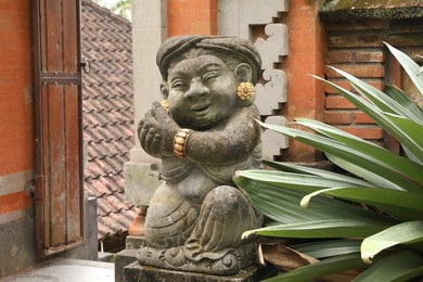 Photo of Bali, Indonesia - May 31, 2025: Beautiful Dvarapala statue outdoors