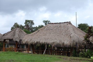 Photo of Beautiful gazebos with tables and chairs at resort