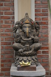 Photo of Bali, Indonesia - May 31, 2025: Beautiful Ganesha statue at temple