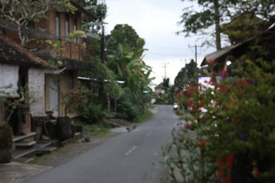 Photo of Blurred view of empty road in city