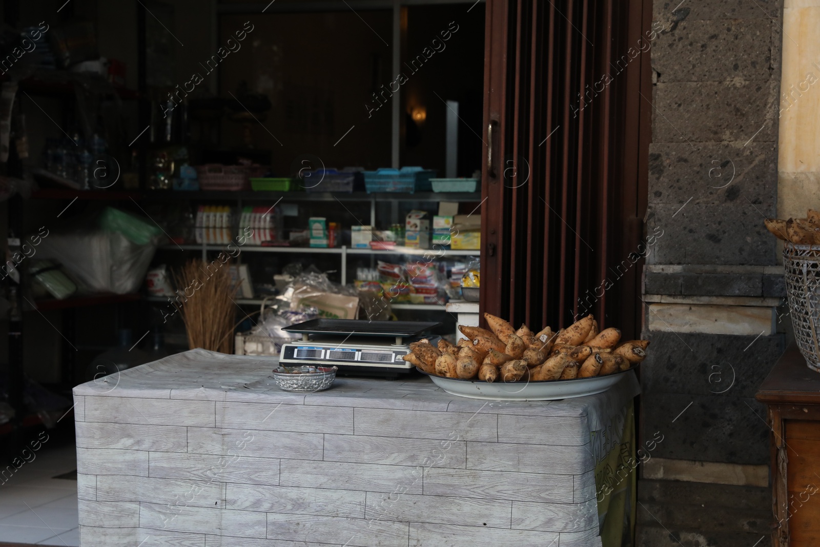 Bali, Indonesia - June 6, 2025: Sweet potatoes and other products in market Photo of Bali, Indonesia - June 6, 2025: Sweet potatoes and other products in market