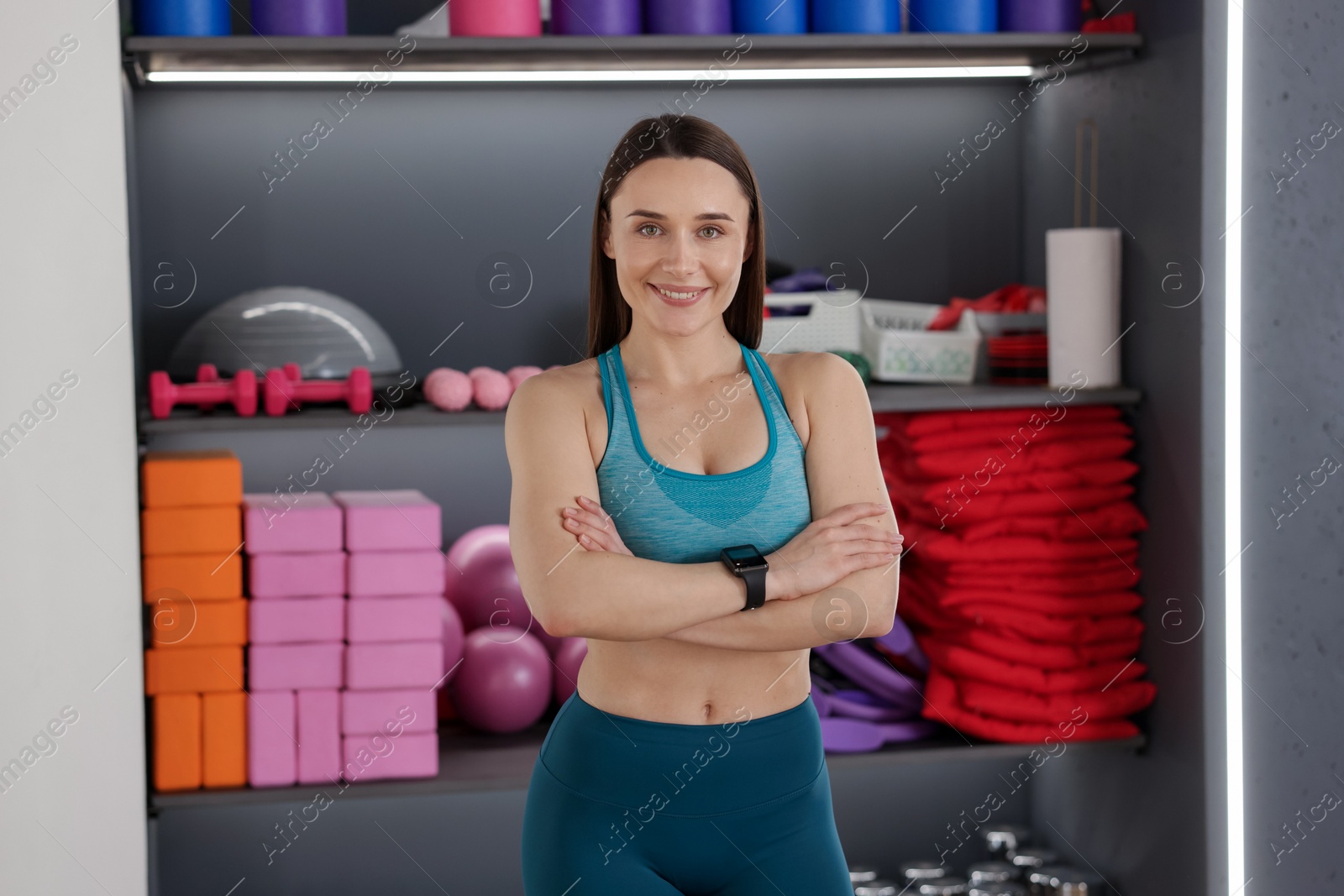 Beautiful woman wearing sportswear in fitness studio Photo of Beautiful woman wearing sportswear in fitness studio