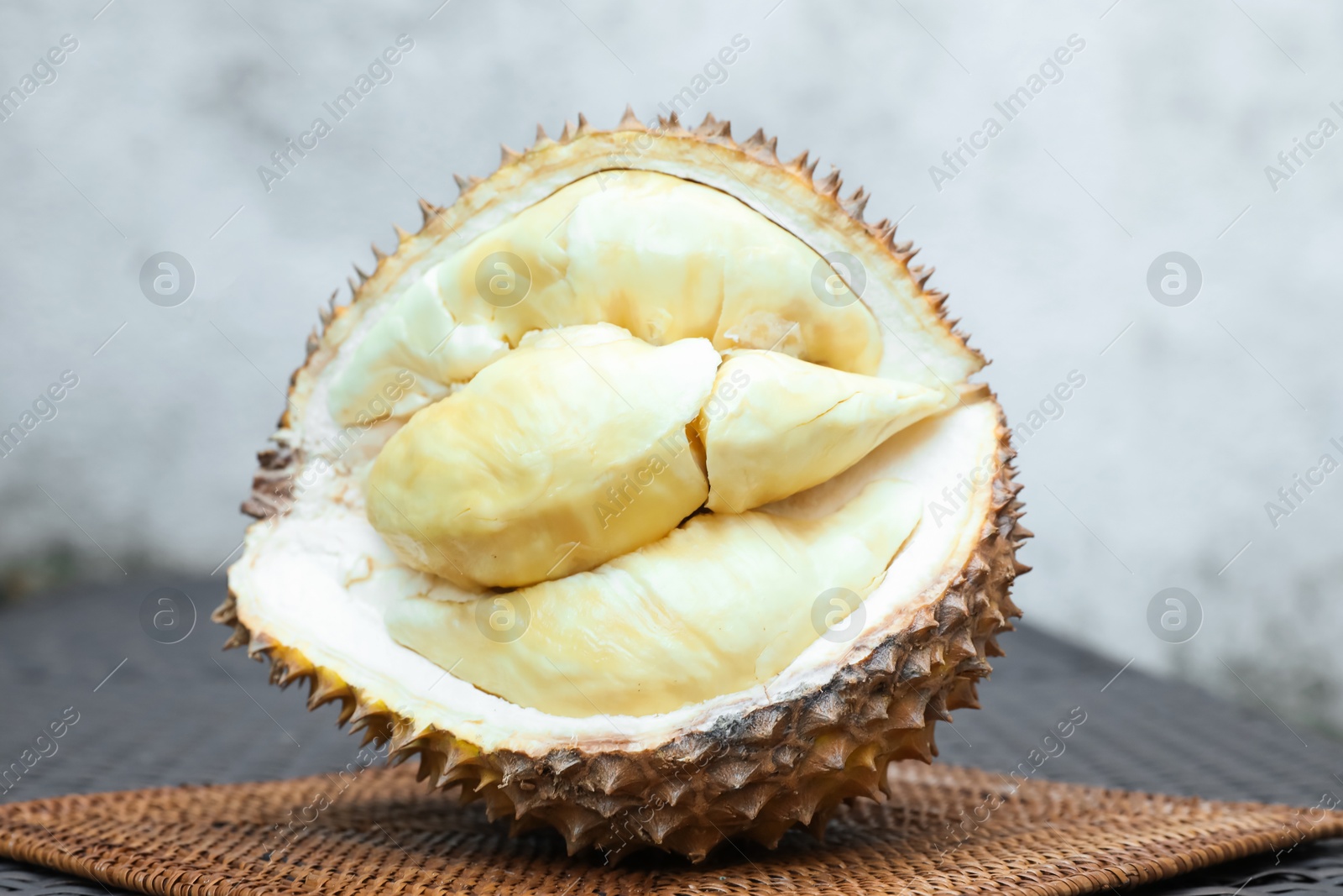 Fresh ripe durian on table outdoors, closeup Photo of Fresh ripe durian on table outdoors, closeup