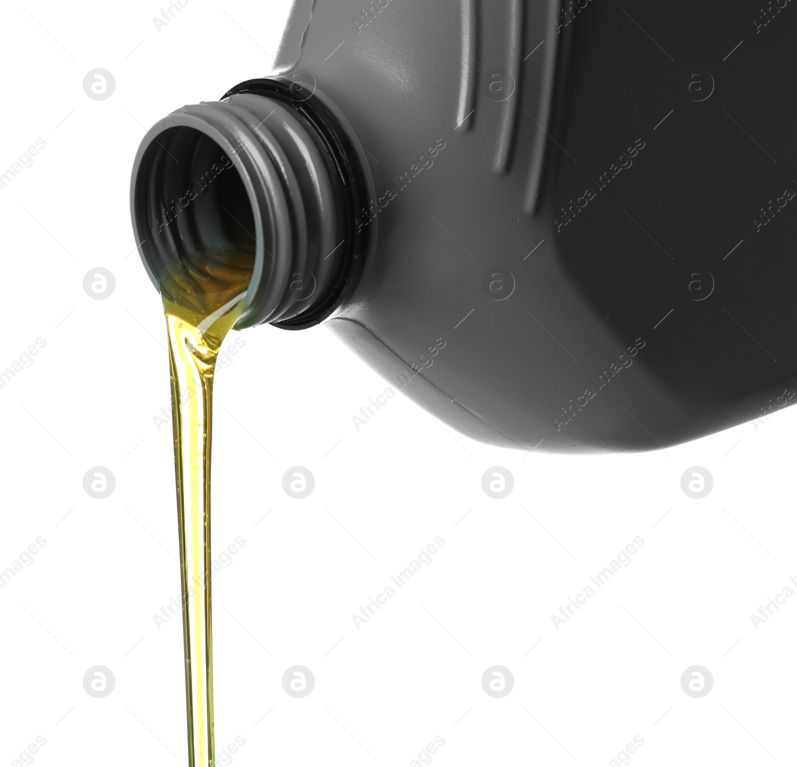 Pouring motor oil from grey canister isolated on white Photo of Pouring motor oil from grey canister isolated on white