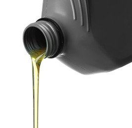 Photo of Pouring motor oil from grey canister isolated on white