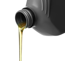 Photo of Pouring motor oil from grey canister isolated on white