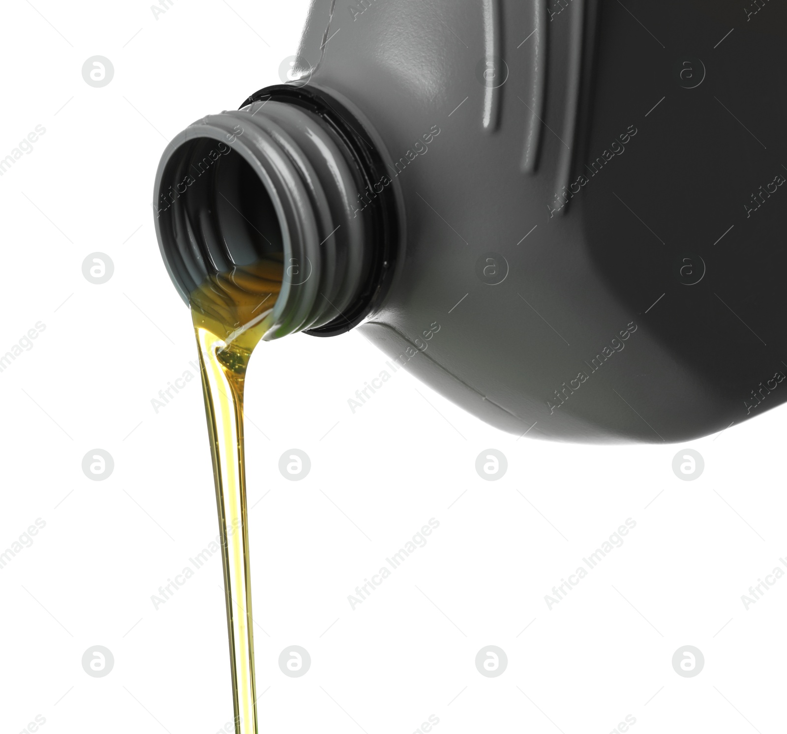 Pouring motor oil from grey canister isolated on white Photo of Pouring motor oil from grey canister isolated on white