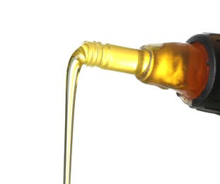 Photo of Pouring motor oil from yellow canister isolated on white