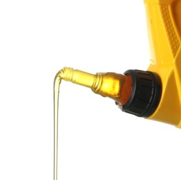 Photo of Pouring motor oil from yellow canister isolated on white