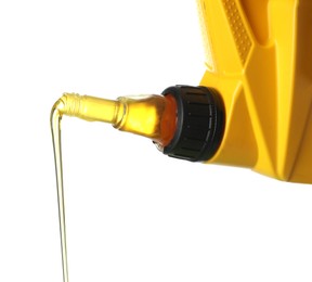 Photo of Pouring motor oil from yellow canister isolated on white