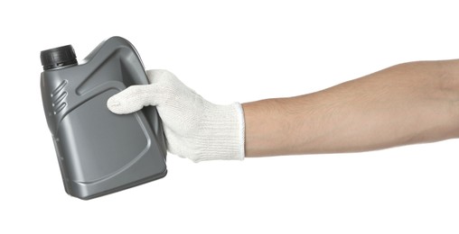 Photo of Man with grey canister of motor oil on white background, closeup