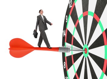 Image of Goal achievement, business success and targeting. Businesswoman walking on dart sticking in center of dartboard against white background