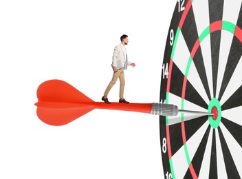 Image of Targeting, goal achievement. Art collage with businessman walking on dart sticking in center of dartboard against white background