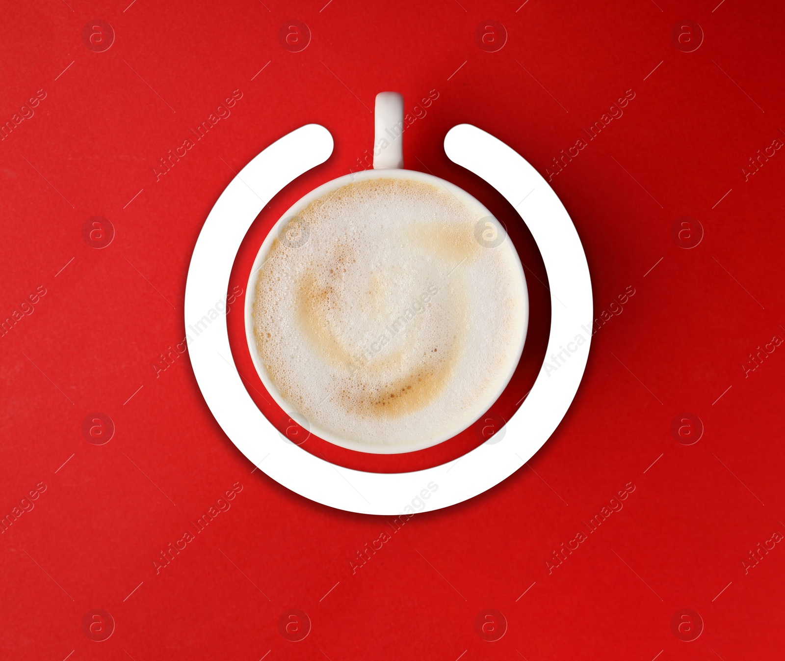 Cup of coffee and circle combined into power symbol on red background, top view Image of Cup of coffee and circle combined into power symbol on red background, top view