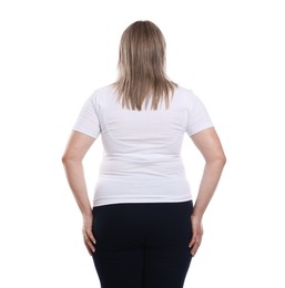 Photo of Weight loss. Plus size woman on white background, back view