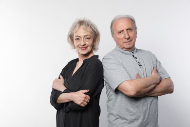 Photo of Portrait of lovely senior couple on white background