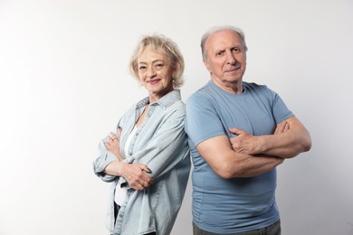 Photo of Portrait of lovely senior couple on white background