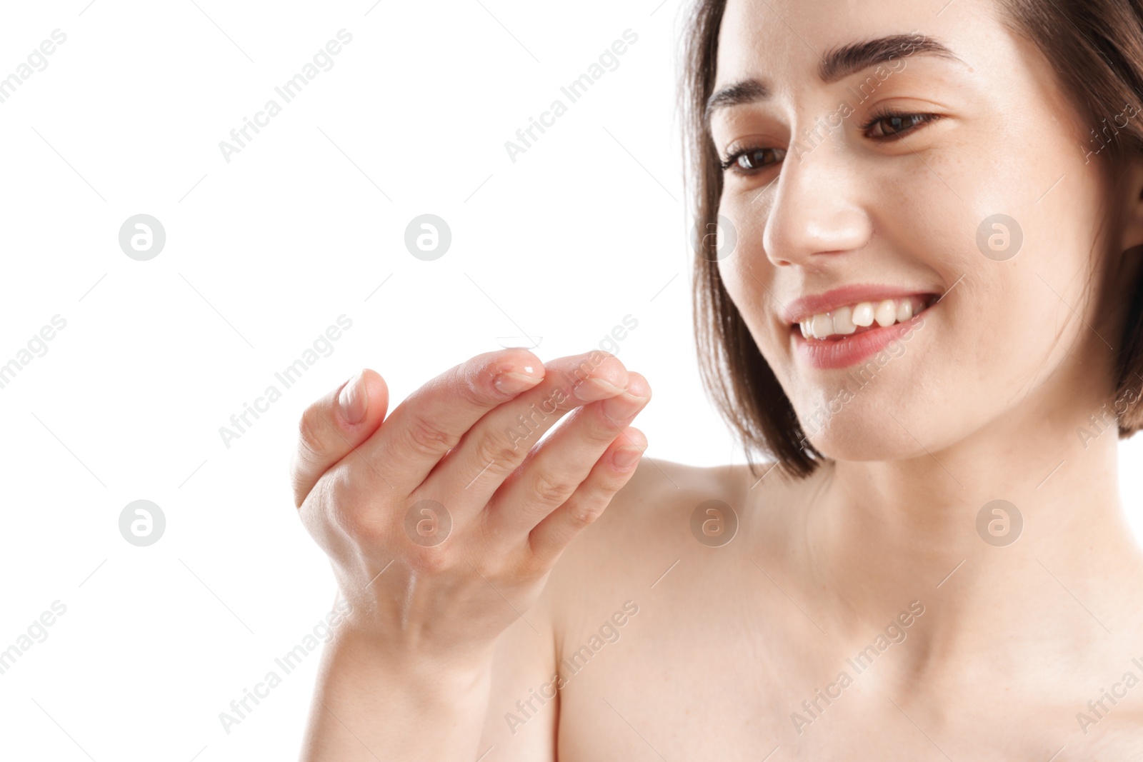 Photo of Woman with contact lens on white background, closeup