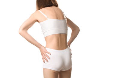 Photo of Woman suffering from anorexia on white background, closeup
