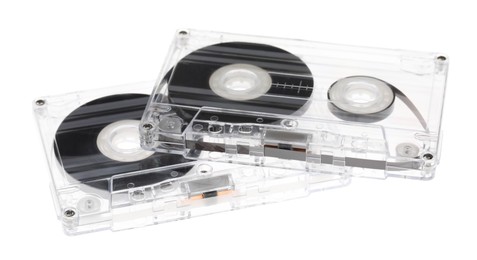Photo of Audio cassettes with magnetic tapes isolated on white