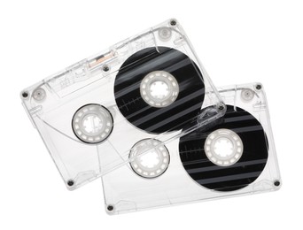 Photo of Audio cassettes with magnetic tapes isolated on white