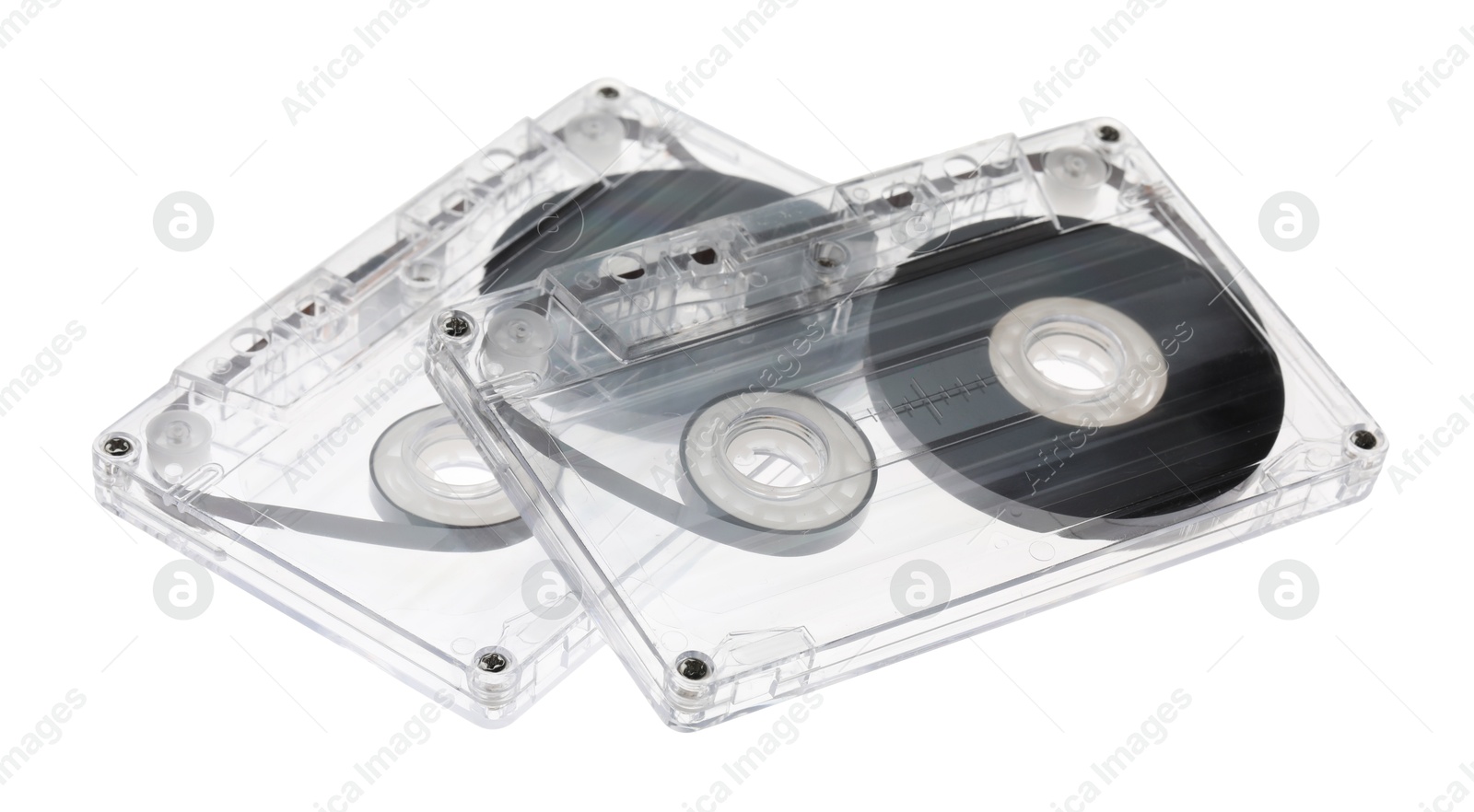 Audio cassettes with magnetic tapes isolated on white Photo of Audio cassettes with magnetic tapes isolated on white