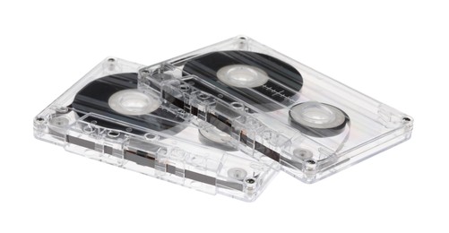 Photo of Audio cassettes with magnetic tapes isolated on white