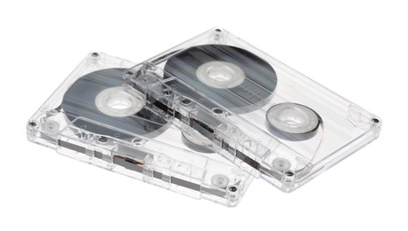 Photo of Audio cassettes with magnetic tapes isolated on white