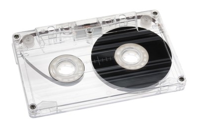 Photo of One audio cassette with magnetic tape isolated on white