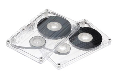 Photo of Audio cassettes with magnetic tapes isolated on white