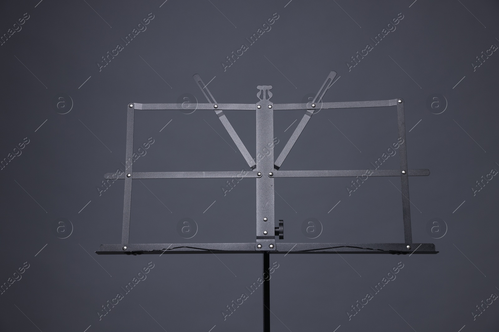 One empty note stand on grey background Photo of One empty note stand on grey background