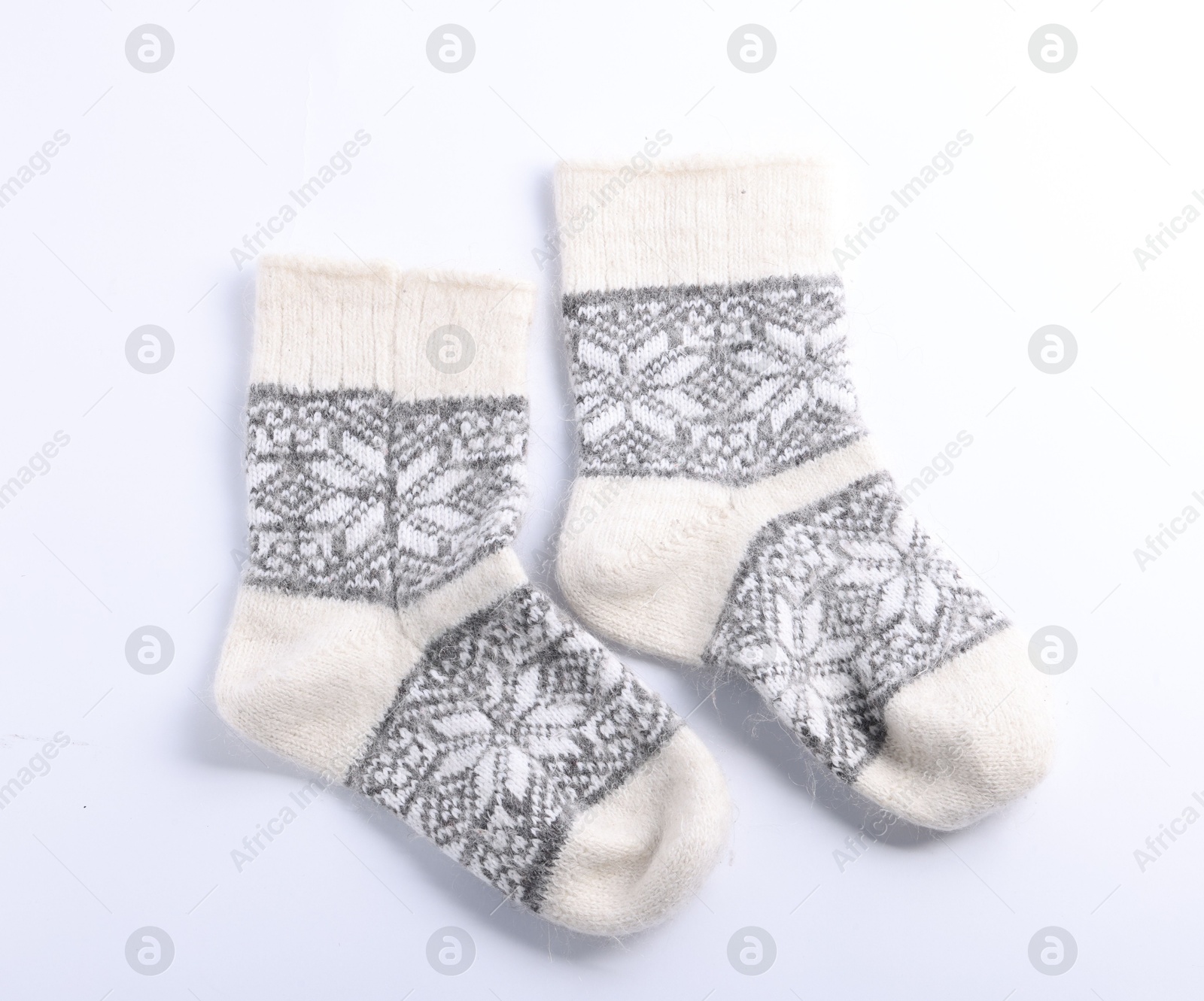 Pair of wool socks isolated on white, top view Photo of Pair of wool socks isolated on white, top view