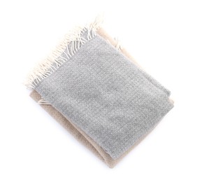 Photo of Two different wool scarves isolated on white, top view