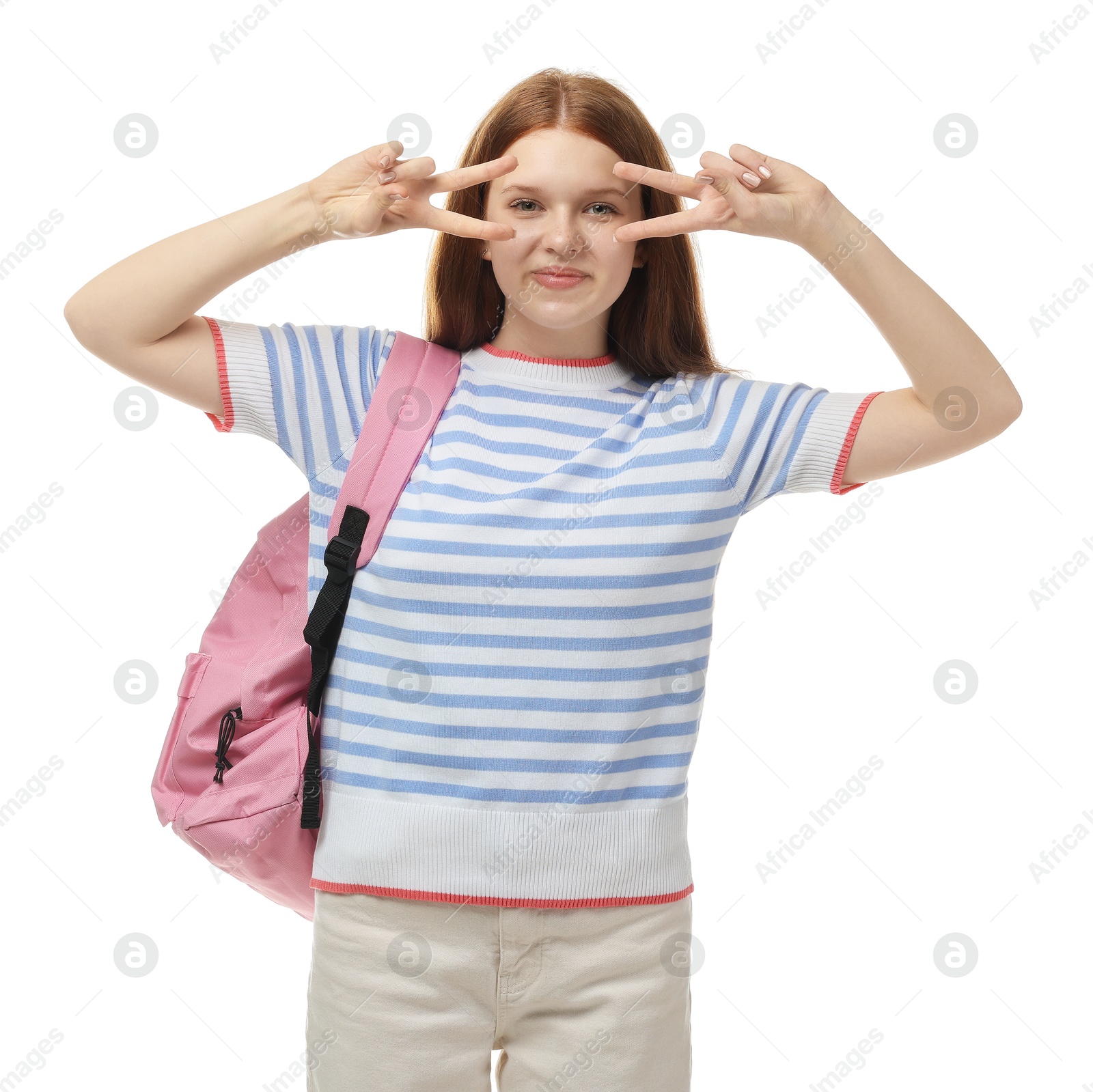 Teenage girl with backpack posing on white background Photo of Teenage girl with backpack posing on white background