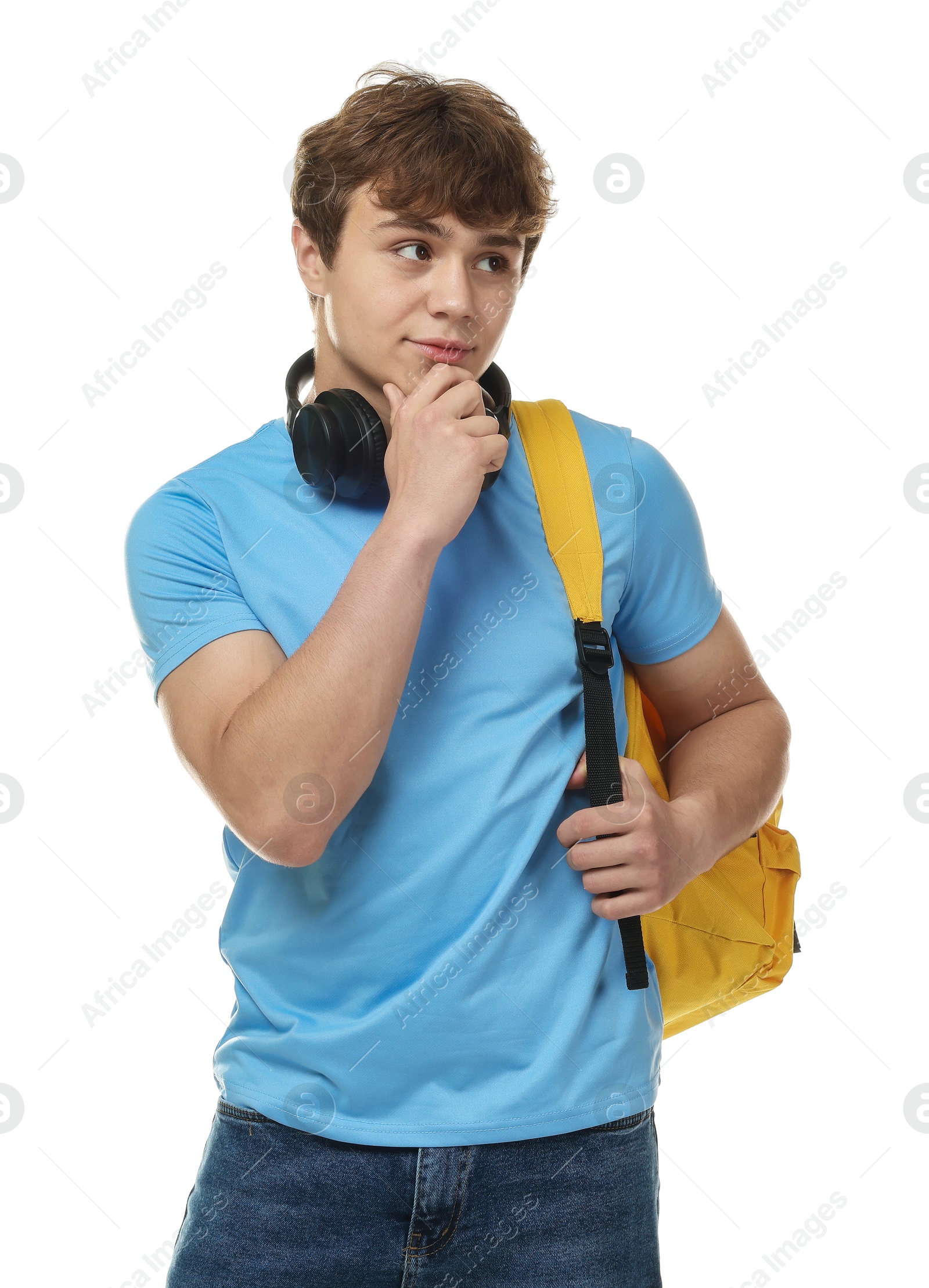 Teenage boy with headphones and backpack on white background Photo of Teenage boy with headphones and backpack on white background