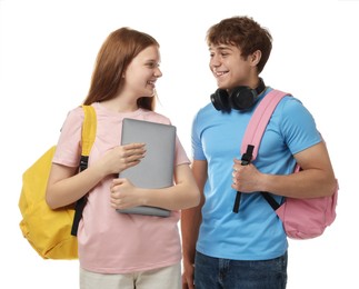 Photo of Teenage girl and boy with laptop on white background